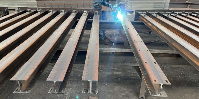 How is the strength of structural steel sections measured?