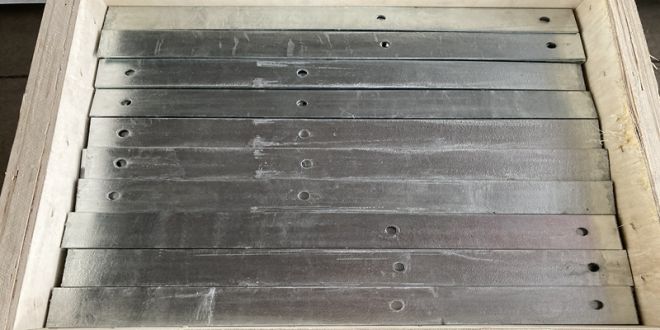 How do slotted plates improve structural integrity?